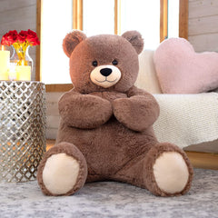 Vermont Teddy Bear 100% recycled stuffing, sustainable construction for durable cuddles.