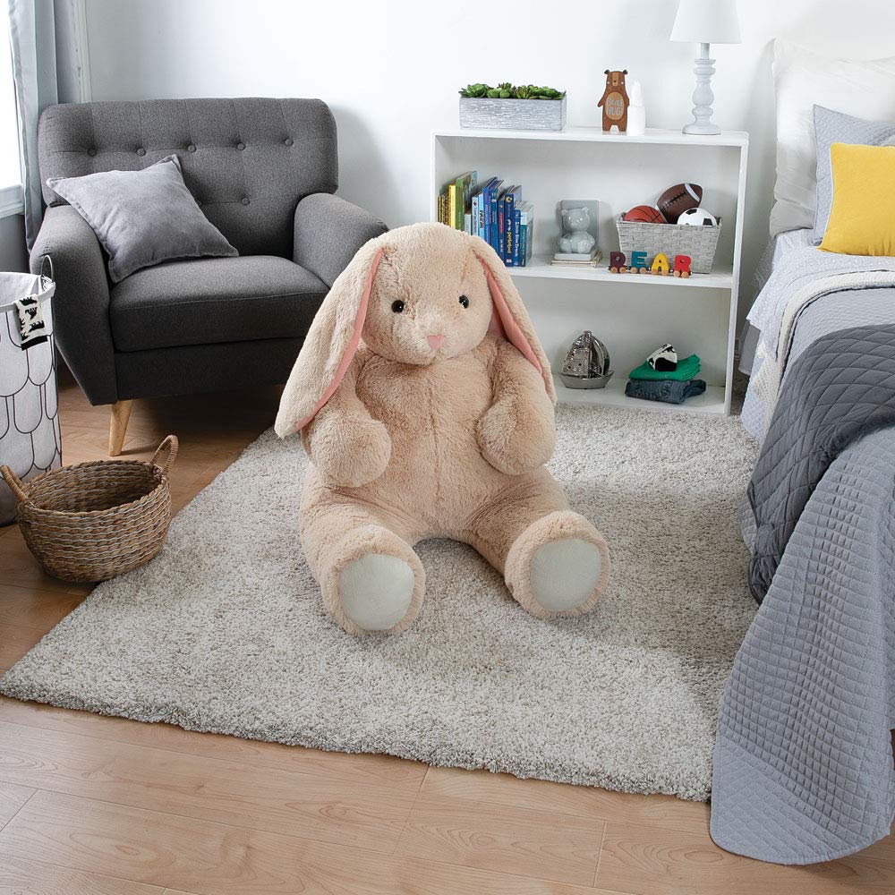 Vermont Teddy Bear giant bunny 4ft recycled stuffing inside demonstrates eco-friendly comfort.