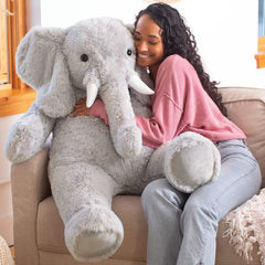 Vermont Teddy Bear Giant Elephant four-foot size offers a commanding, comforting presence for any room