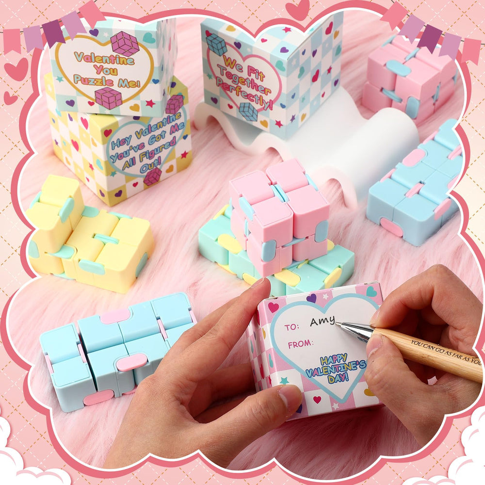 VioraWhite cubes held in hand illustrating portable focus tools.