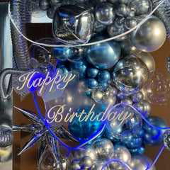 Voircoloria adhesive dots and ribbons help secure balloon displays.
