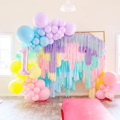 Voircoloria balloon arch setup with pastel colors for romantic backdrops