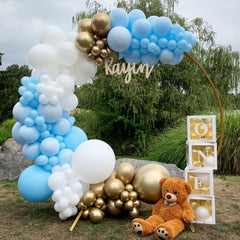 Voircoloria gender reveal decor with soft blue balloons