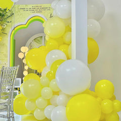 Voircoloria pastel yellow 18-inch balloons create bold focal points in events
