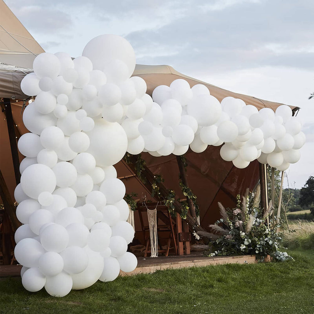 Voircoloria wedding and baby shower setup with white balloons