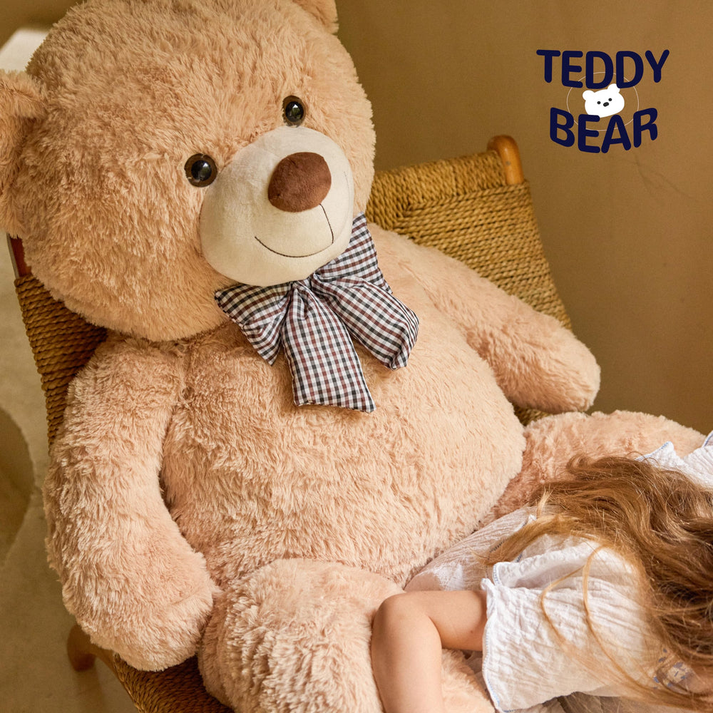 Vposyako giant teddy bear in a snuggle moment on the sofa