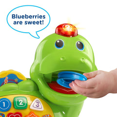 VTech Chomp and Count Dino shows colorful pieces for color recognition