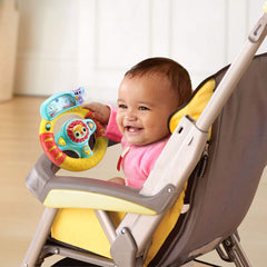 VTech Grip and Go steering wheel signal lights flash with tunes for attention