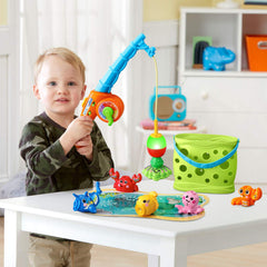 VTech Jiggle and Giggle Fishing Set stores all pieces in the included bucket after play.