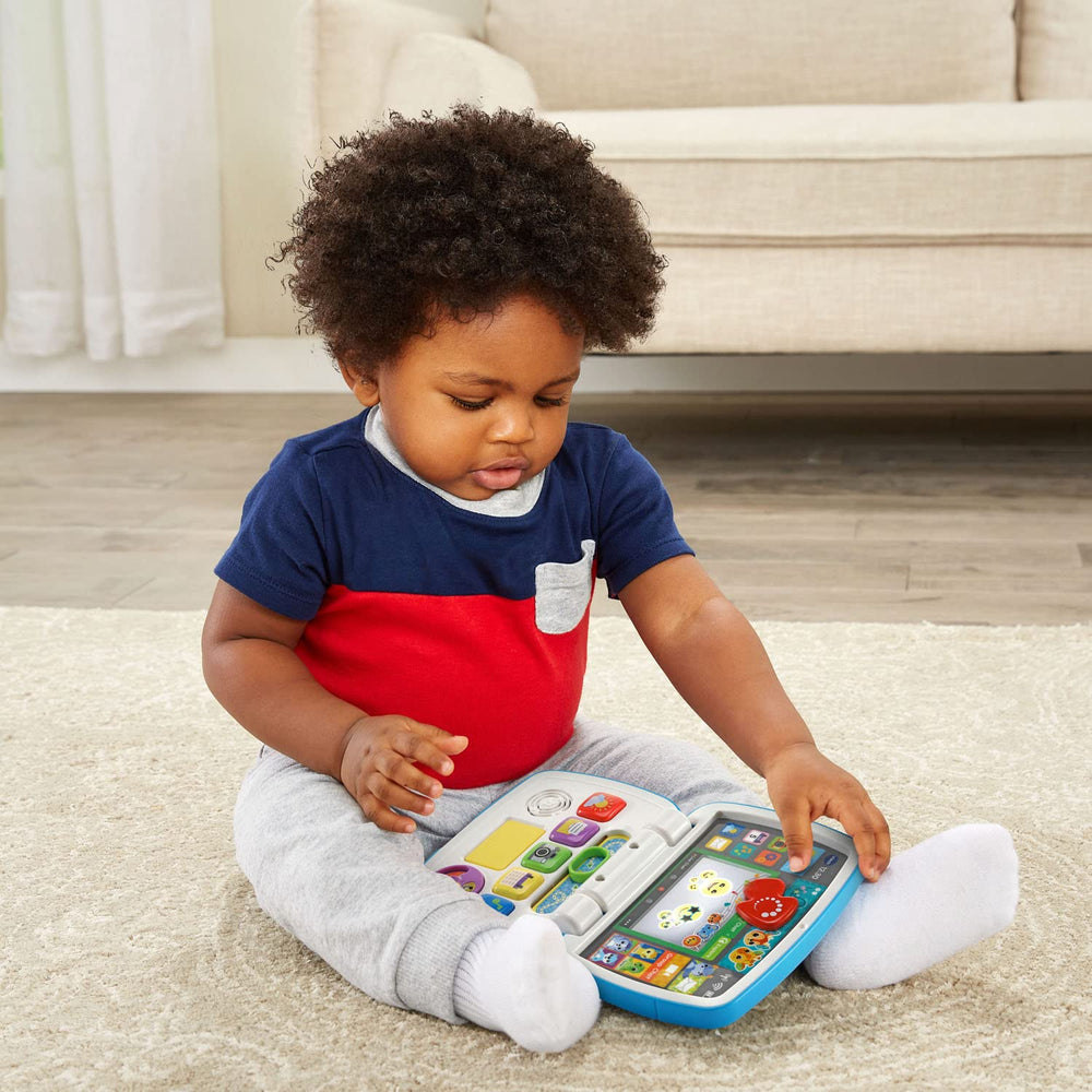 VTech Toddler Tech Laptop weather app button introduces weather words through touch.