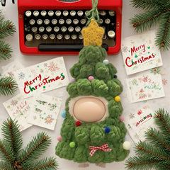 VVQUI green doll outfit with colorful pom-poms, ideal for holiday display.