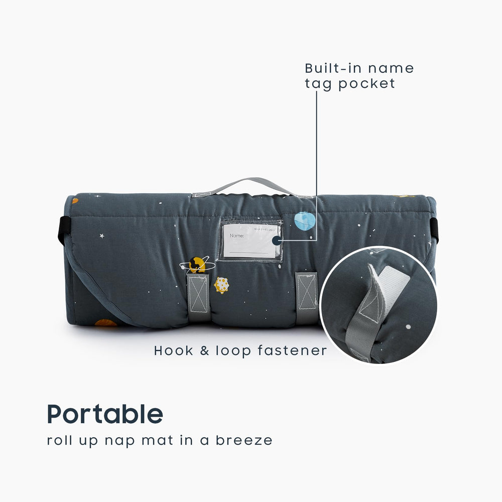Wake In Cloud nap mat rolls up with hook and loop fastener for easy transport.