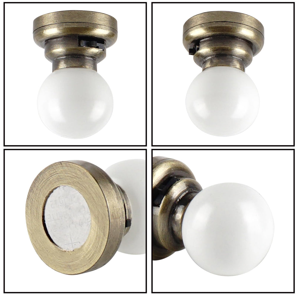 Replaceable button cell battery access for Waldosia dollhouse lighting.