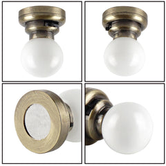 Replaceable button cell battery access for Waldosia dollhouse lighting.