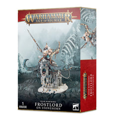Warhammer Frostlord on Stonehorn miniature on battlefield, ideal centerpiece for epic tabletop battles.