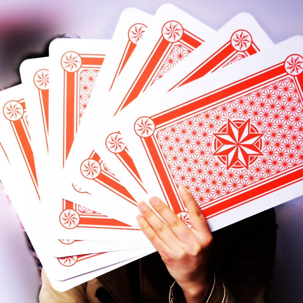 Warmtree bar-game setup with jumbo cards emphasizing social play and visibility.