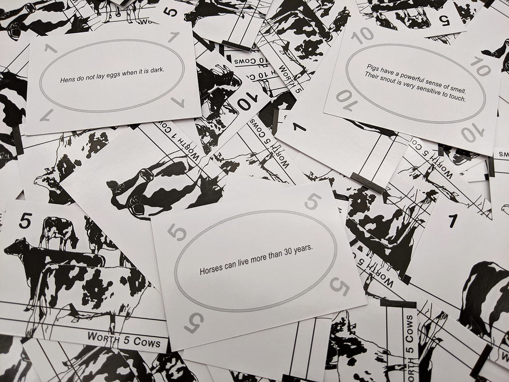 We R Fun Life on the Farm cow cards with fun facts, adding farm-life flavor.