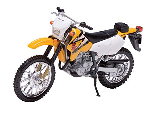 Welly Suzuki DR-Z400S die-cast bike with rotating tires for display realism.