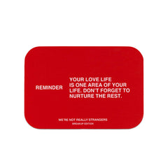 WE'RE NOT REALLY STRANGERS packaging highlights a compact, portable breakup kit for healing.