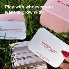 WE'RE NOT REALLY STRANGERS Self-Love Edition question cards spread sparks honest self-reflection.