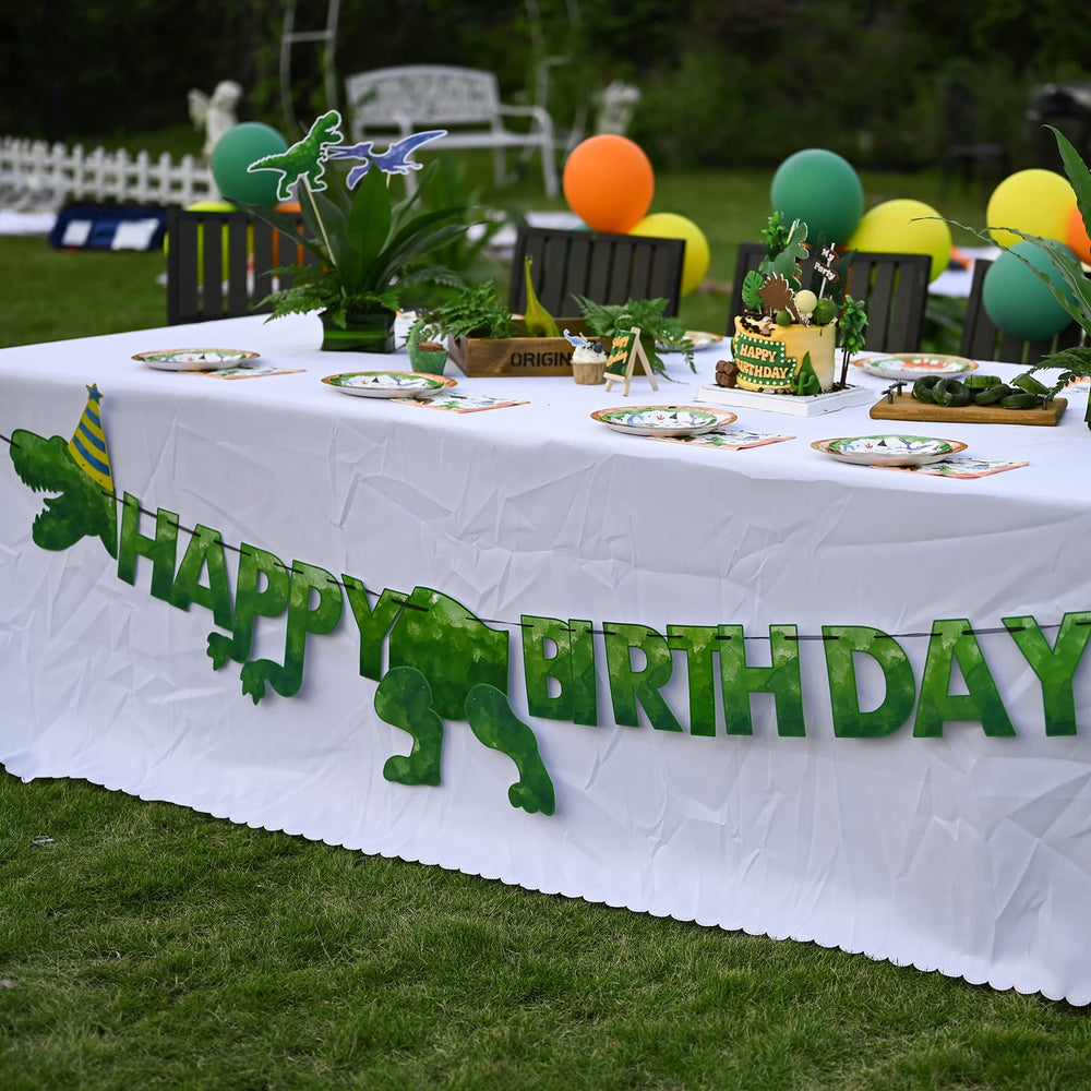 WERNNSAI green dinosaur banner adds whimsical focal point to celebration.