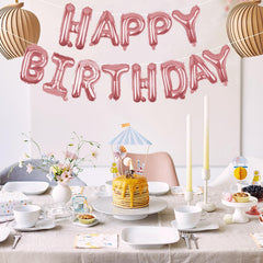 WESTGO party decor banner inflatable rose gold shown in living room setup
