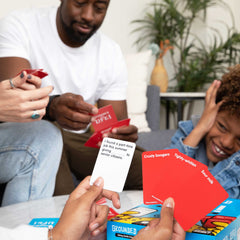 WHAT DO YOU MEME Grounded for Life group laughing during a mini family game night