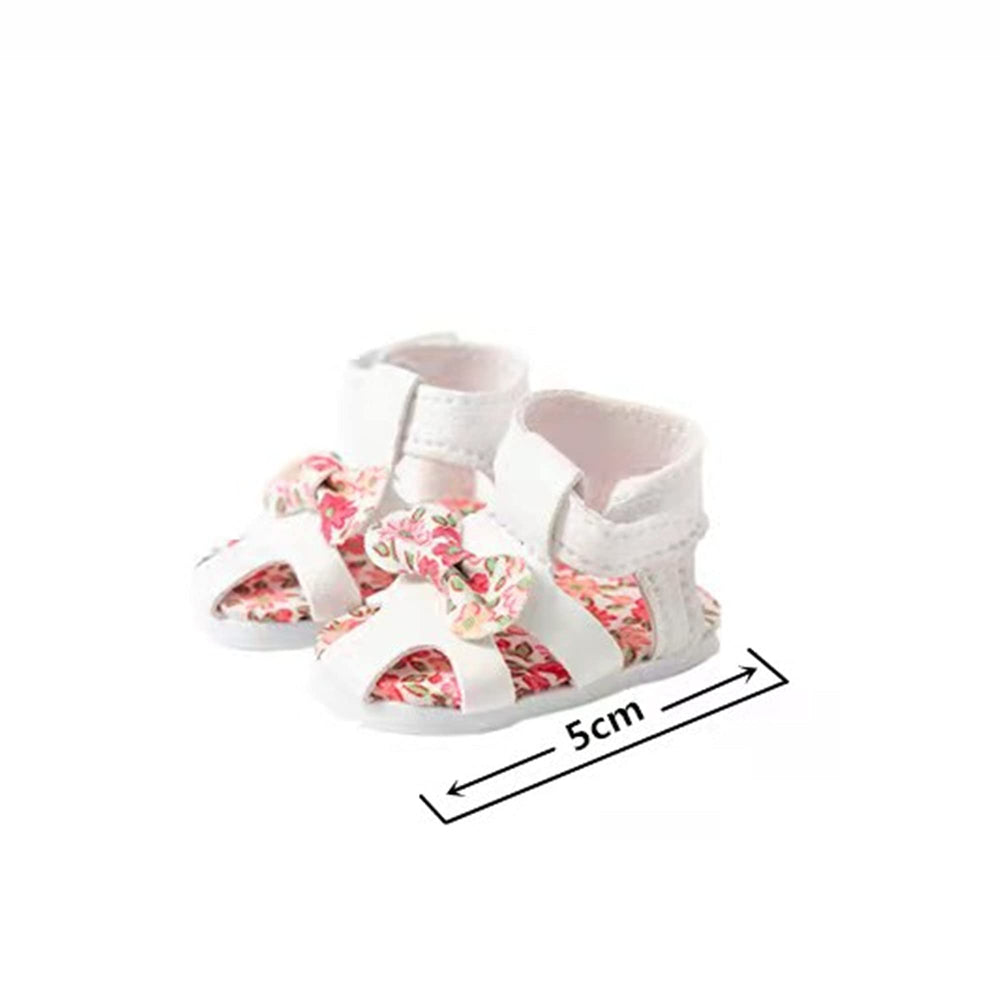 WHYS FXSN doll shoes display shows eight styles for Wellie Wishers, great for mix-and-match play.
