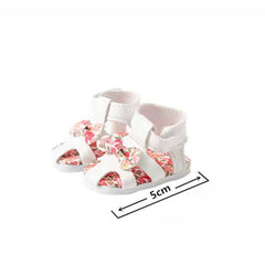 WHYS FXSN doll shoes display shows eight styles for Wellie Wishers, great for mix-and-match play.