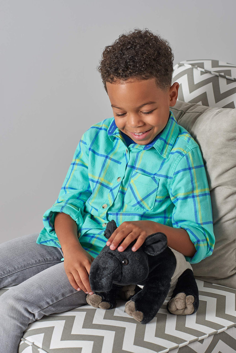 Wild Republic Tapir Plush held by child invites gentle shared play.