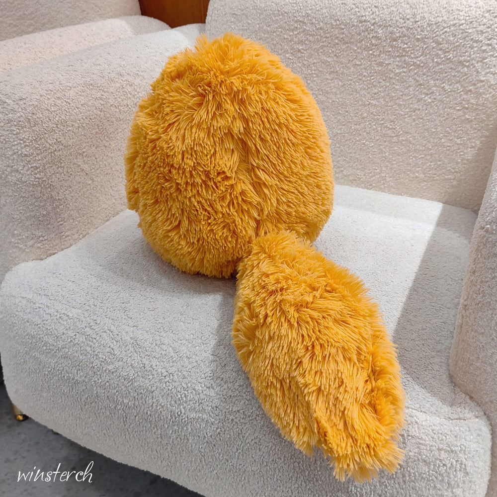 Winsterch orange cat stuffed animal tail view, fluffy long tail