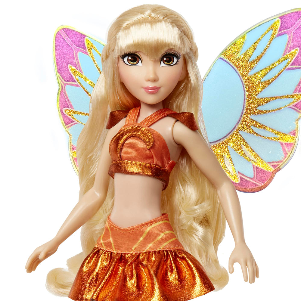 Winx Club Stella face closeup captures cheerful sunlit expression.