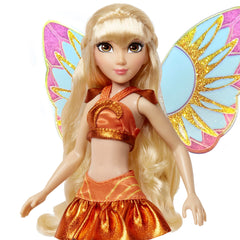 Winx Club Stella face closeup captures cheerful sunlit expression.