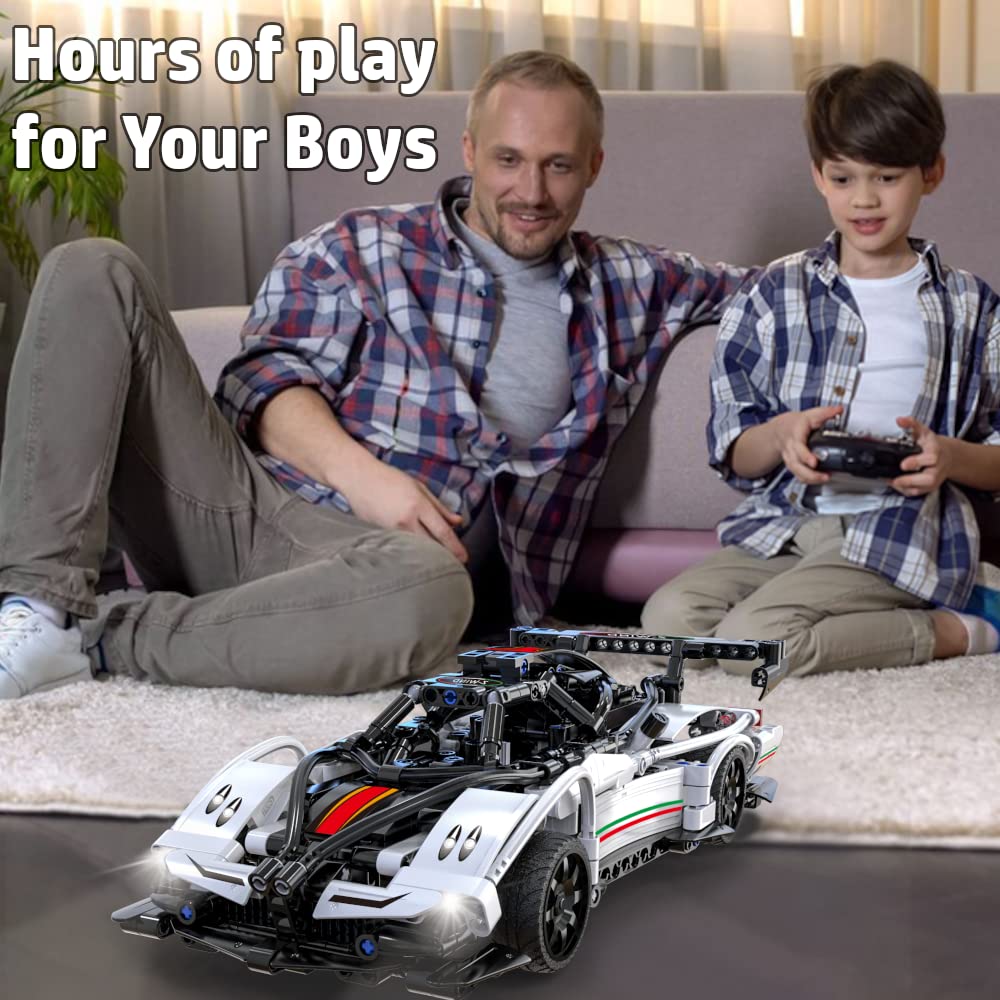 WISEPLAY RC car build action showing hands-on assembly