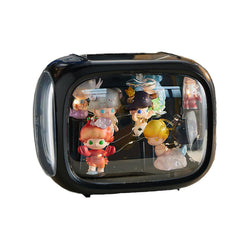 WMM display case with light stand highlights figures for night viewing.