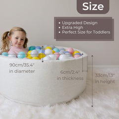 Wonder Space Deluxe ball pit in pastel colors enhances kids' room decor.