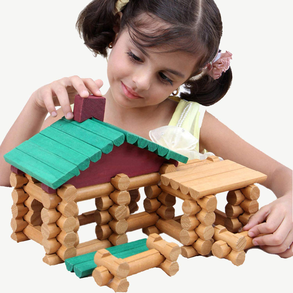 Kids building a cottage with Wondertoys logs to boost spatial awareness.