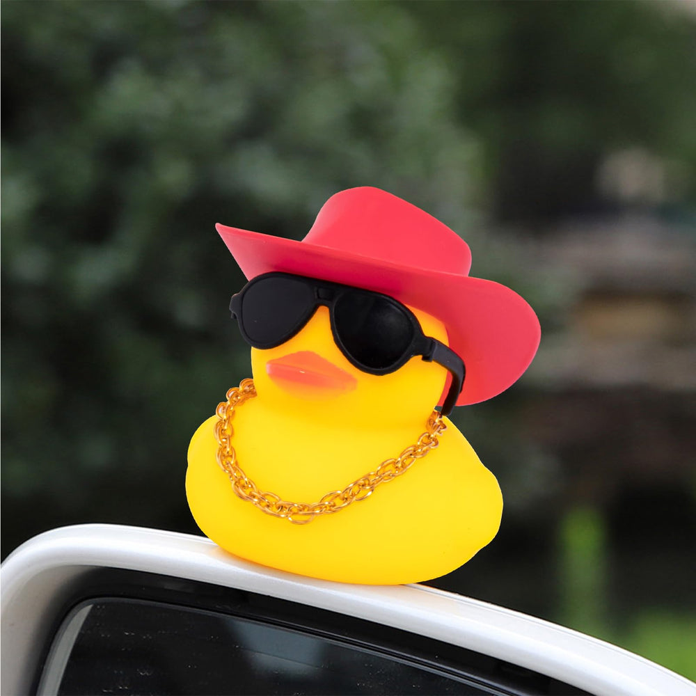 Wonuu rubber duck with necklace and sunglasses adds quirky desk or shelf charm.