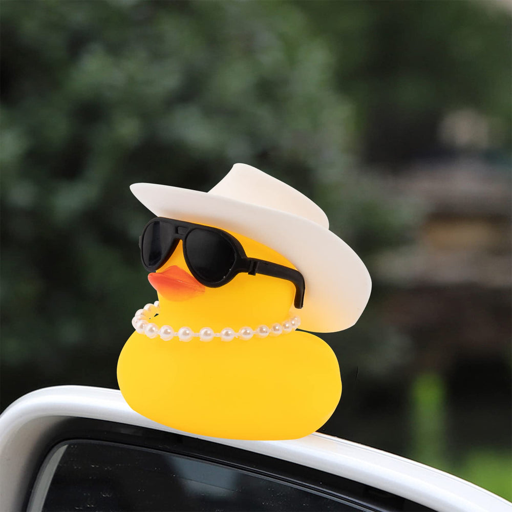 Wonuu car rubber duck with swim ring and necklace adds a fun interior accessory.