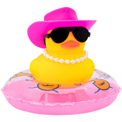 Wonuu rubber duck with sun hat on dashboard for playful car decor.