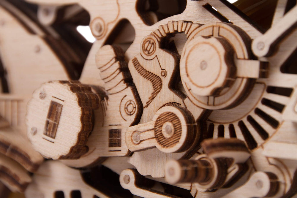 Gear engine rotates wheels, illustrating motion in this detailed 3D wood model.