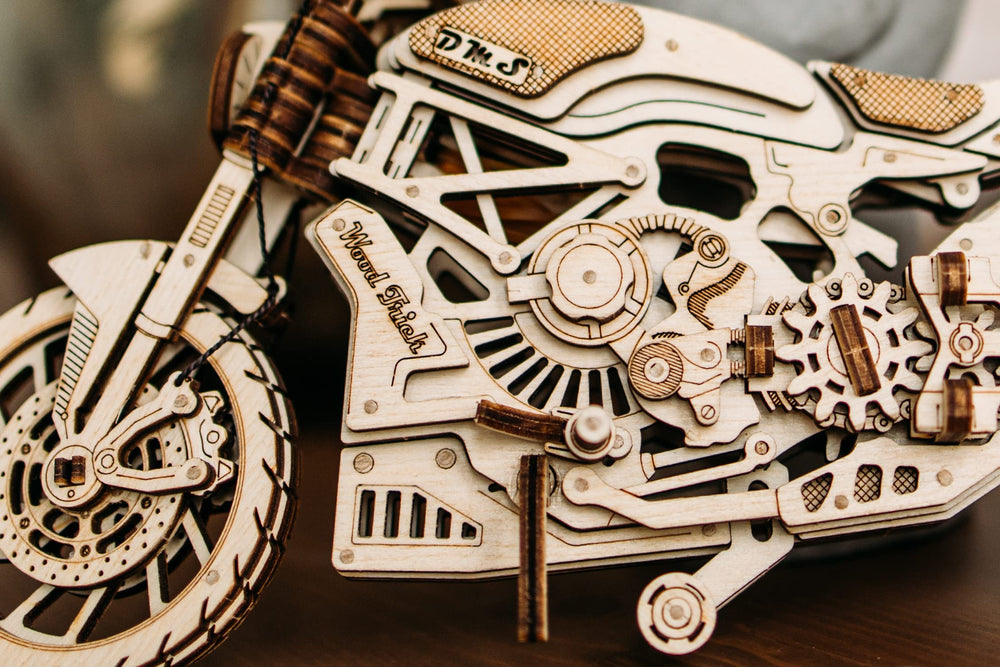 Push the seat to start the bike, a clever interactive feature from Wood Trick kit.