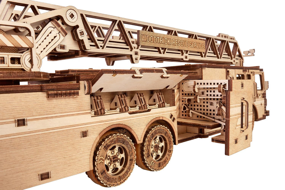 Wood Trick Rescue Firetruck includes three extinguishers and hydrant features for realism.