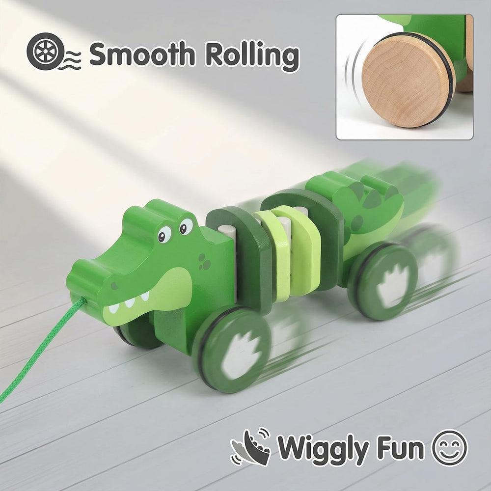 WoodenEdu crocodile pull toy baby-hands use demonstrates easy handling for little fingers.