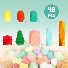 WOODENFUN stones in varied shapes forming a tower to enhance spatial thinking.