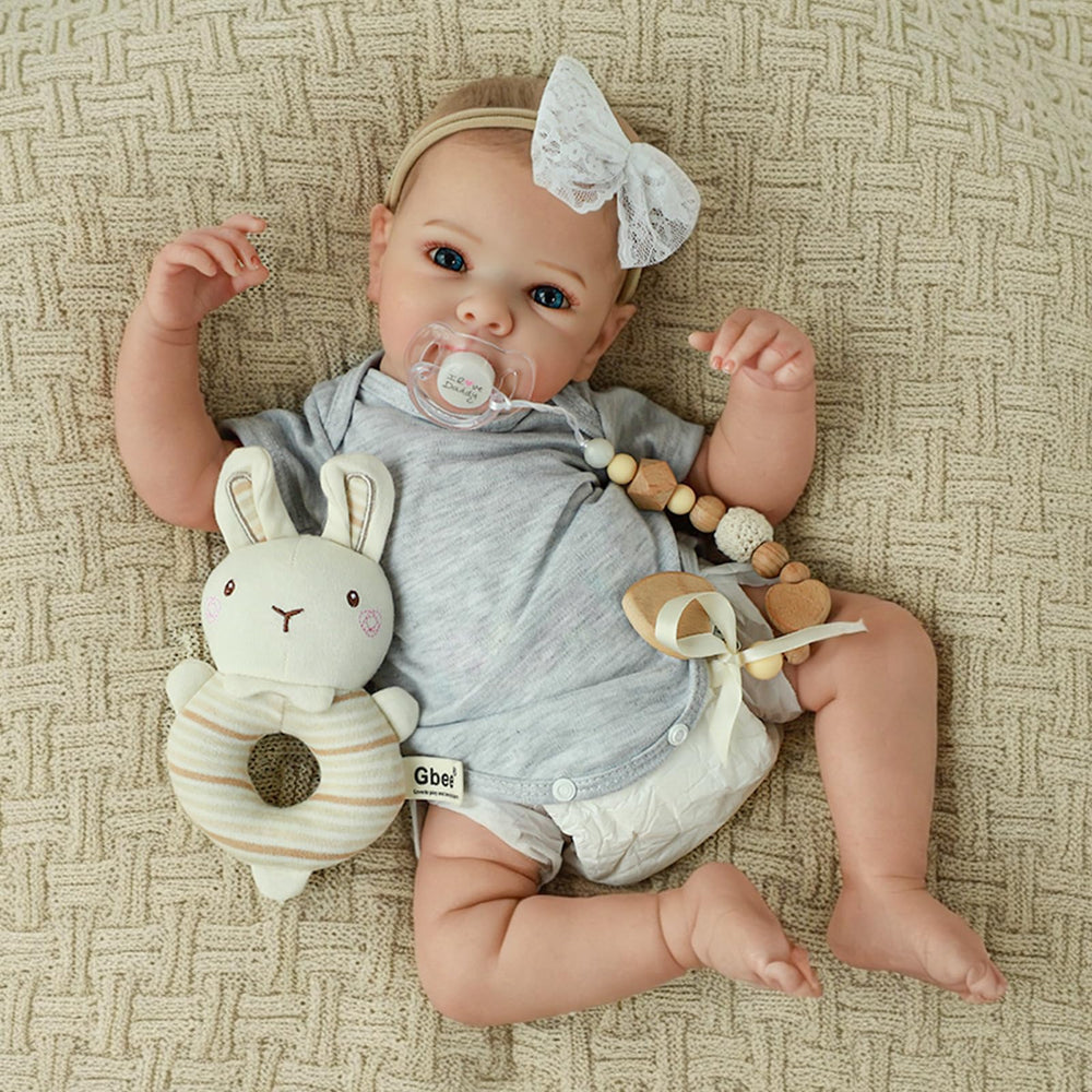 WOOROY Realistic baby girl face with warm expression ideal for imaginative caregiver play.