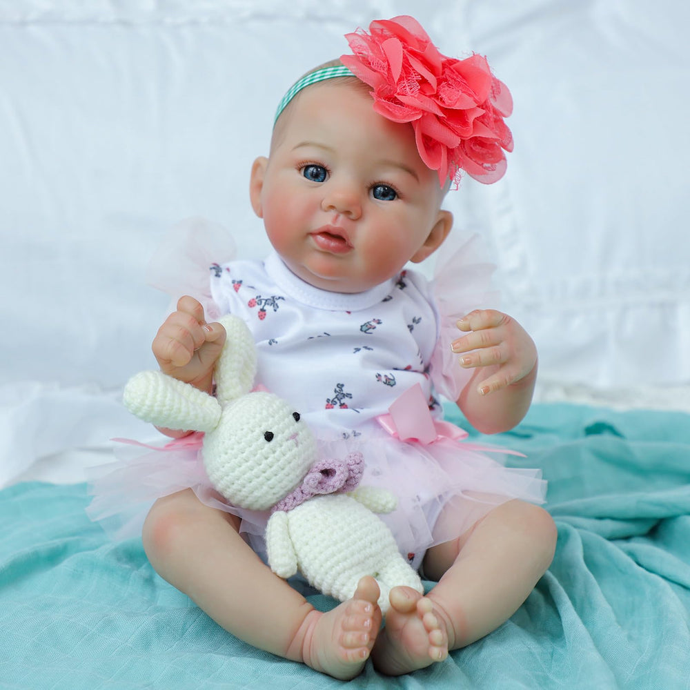 WOOROY floral bodysuit, pink tulle, coral headband add charming styling.