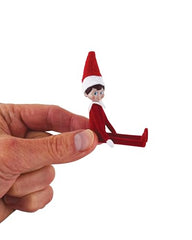 Fully articulated World's Smallest Elf showcases poseable play options.
