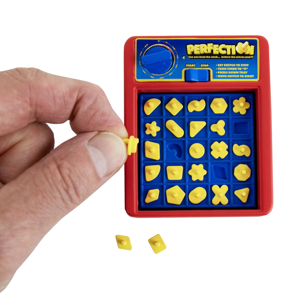 World's Smallest Perfection tray pop moment for quick, portable play on the go