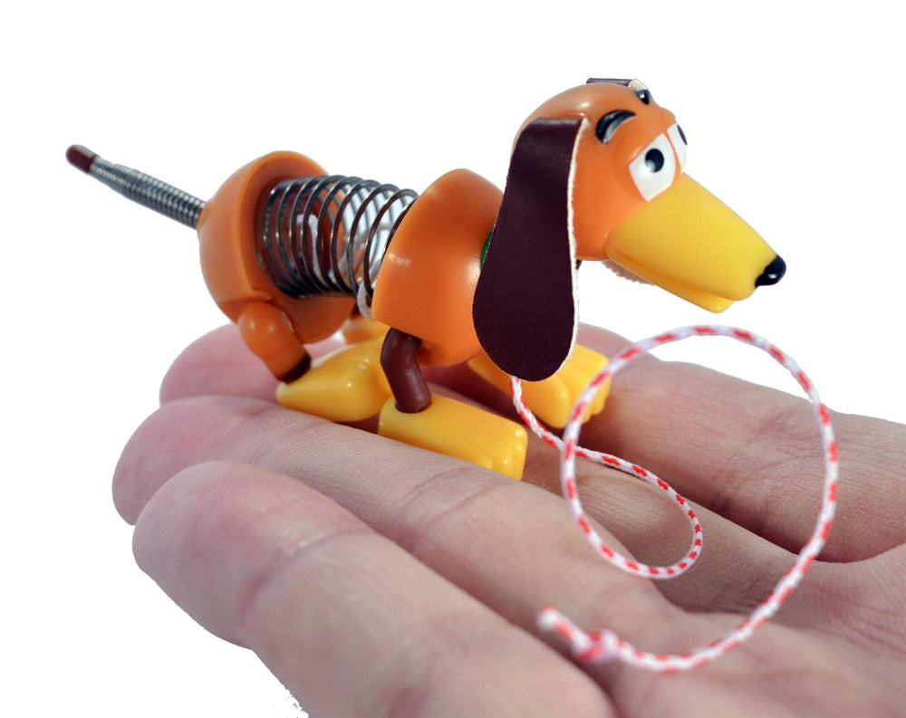 World's Smallest Slinky Dog miniature size—great gift for fans of Toy Story.